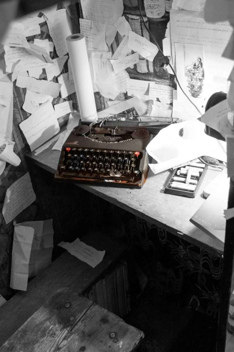 typewriter on messy desk